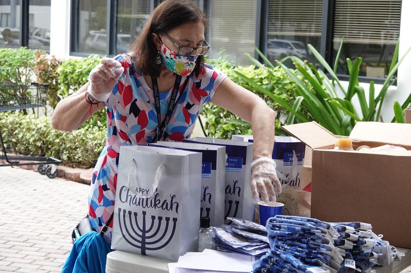 Happy Hanukkah: Agencies give to needy children, Holocaust survivors